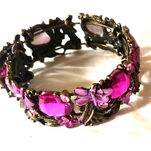 Silver tone with multi color rhinestones